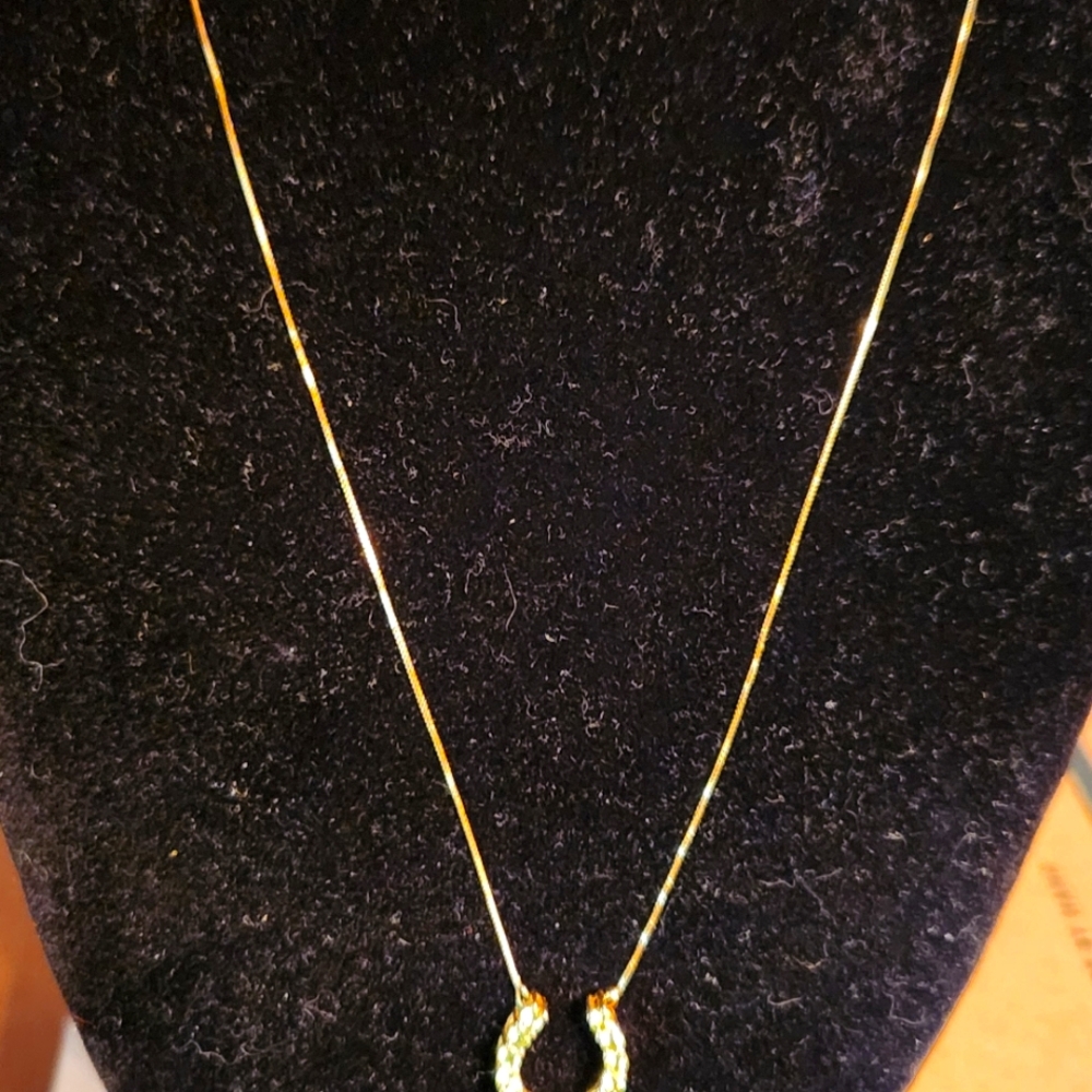 14kt Yellow Gold Horseshoe Necklace with Peridot.  18" Length.